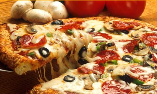 Pasión en cada rebanada: El legado global de la pizza y su arraigo en el paladar venezolano